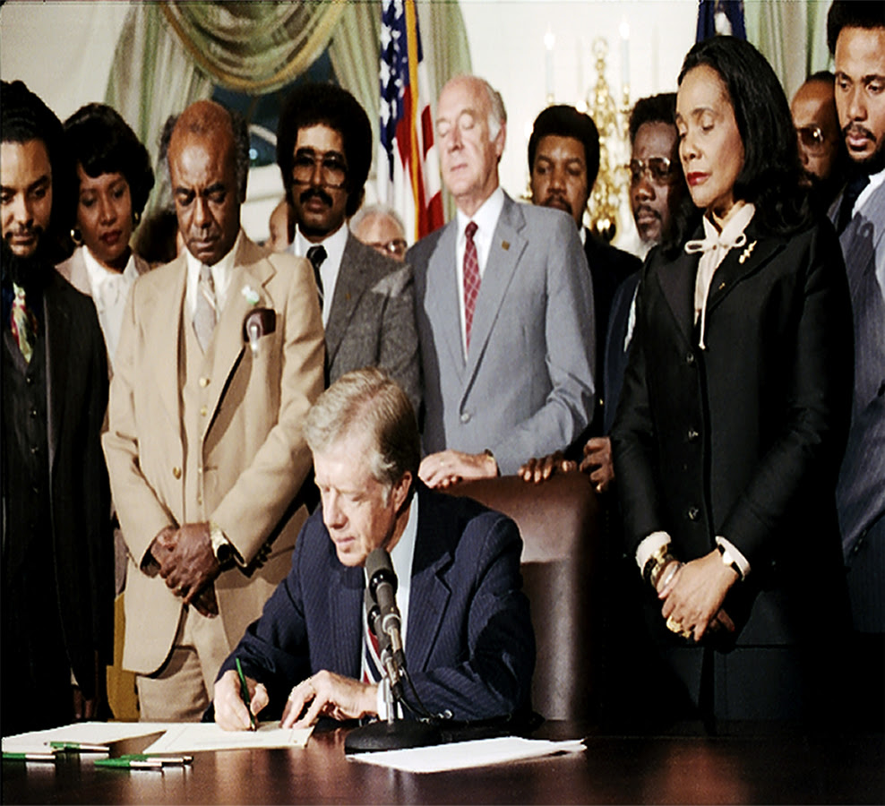 President Jimmy Carter signs legislation officially establishing the Martin Luther King Jr. National Historical Park in Atlanta, Georgia in 1980. (Photo courtesy of the Jimmy Carter Presidential Library.)